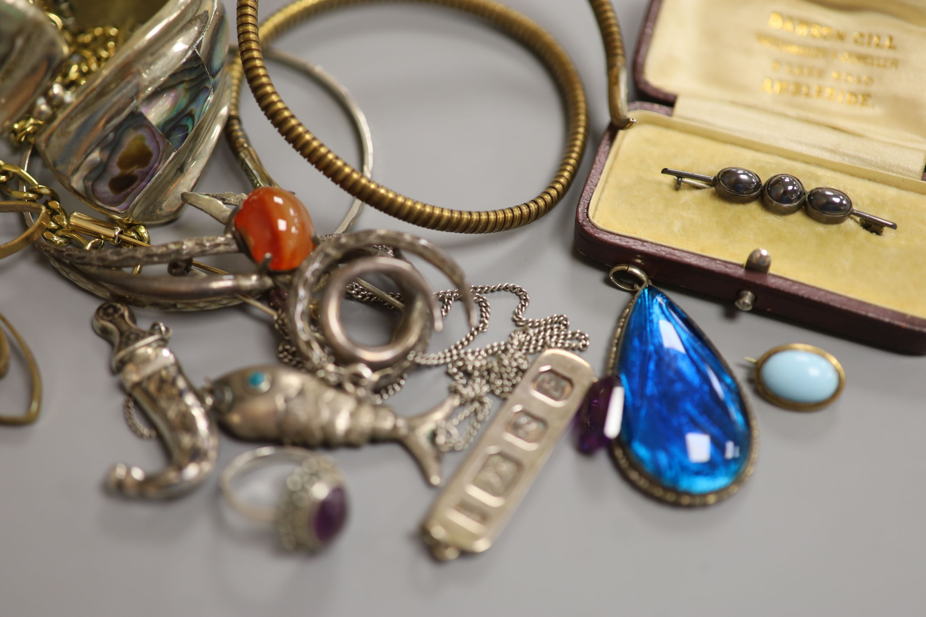 Assorted jewellery including silver pendant and costume.